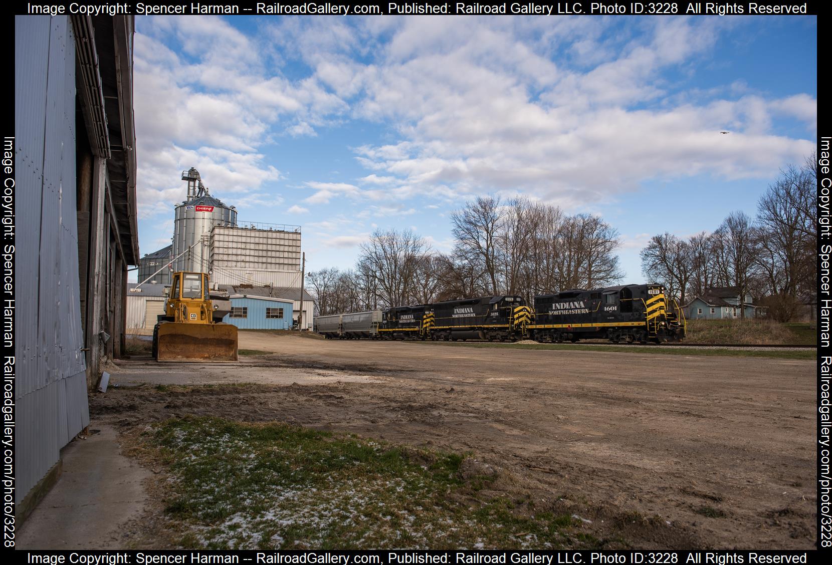 IN 1601 is a class EMD GP7 and  is pictured in Helmer, Indiana, USA.  This was taken along the 4th District on the Indiana Northeastern Railroad. Photo Copyright: Spencer Harman uploaded to Railroad Gallery on 03/25/2024. This photograph of IN 1601 was taken on Sunday, March 24, 2024. All Rights Reserved. 